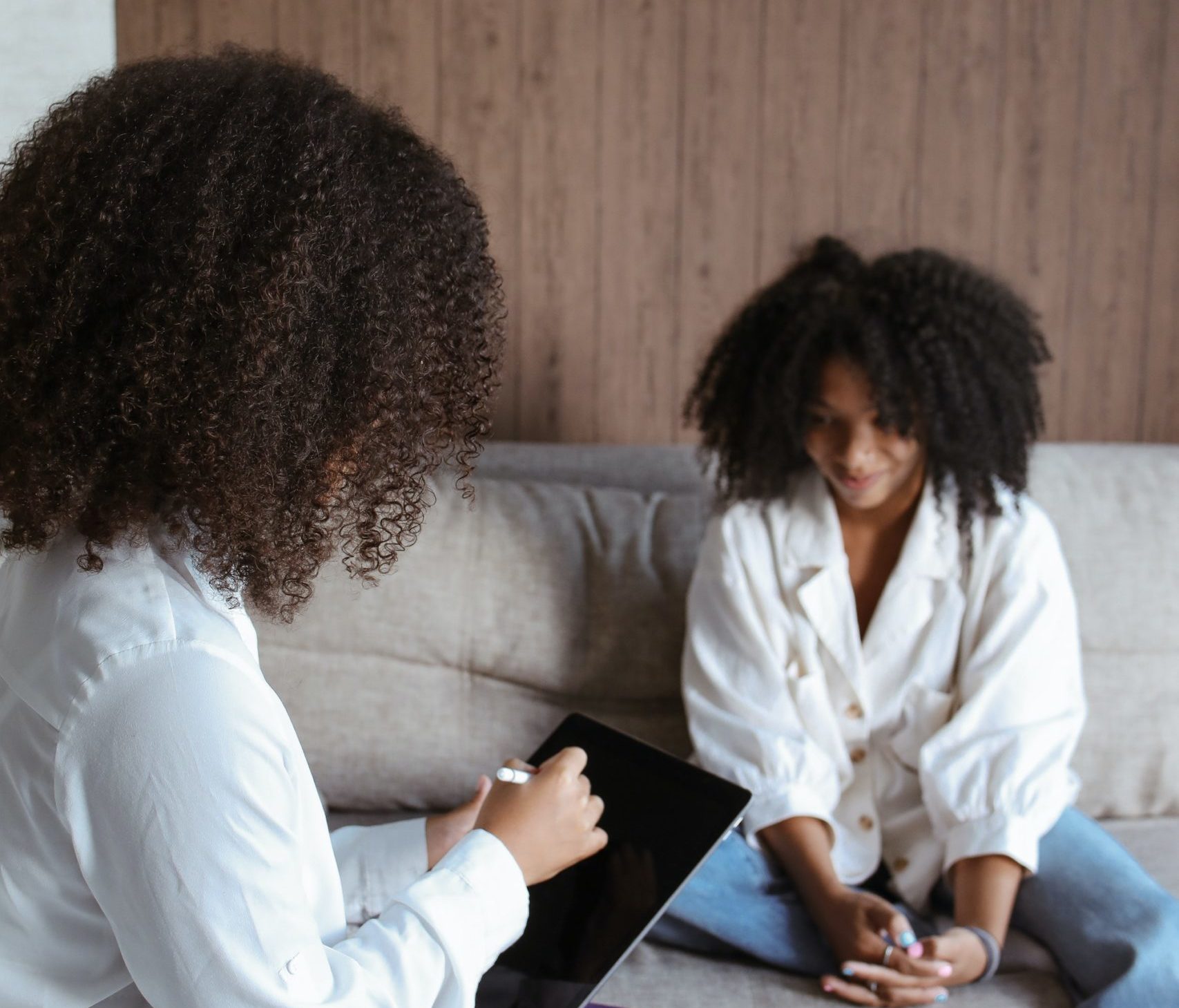 Teenage girl speaking with a therapist that understands her cultural background
