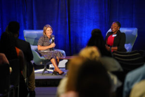 Amy Kennedy and Zainab Okolo on stage at the 2024 Jed Foundation Policy Summit