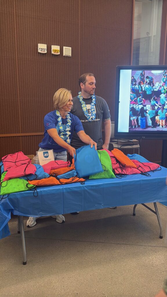 JED staffers hand out mental wellness kits