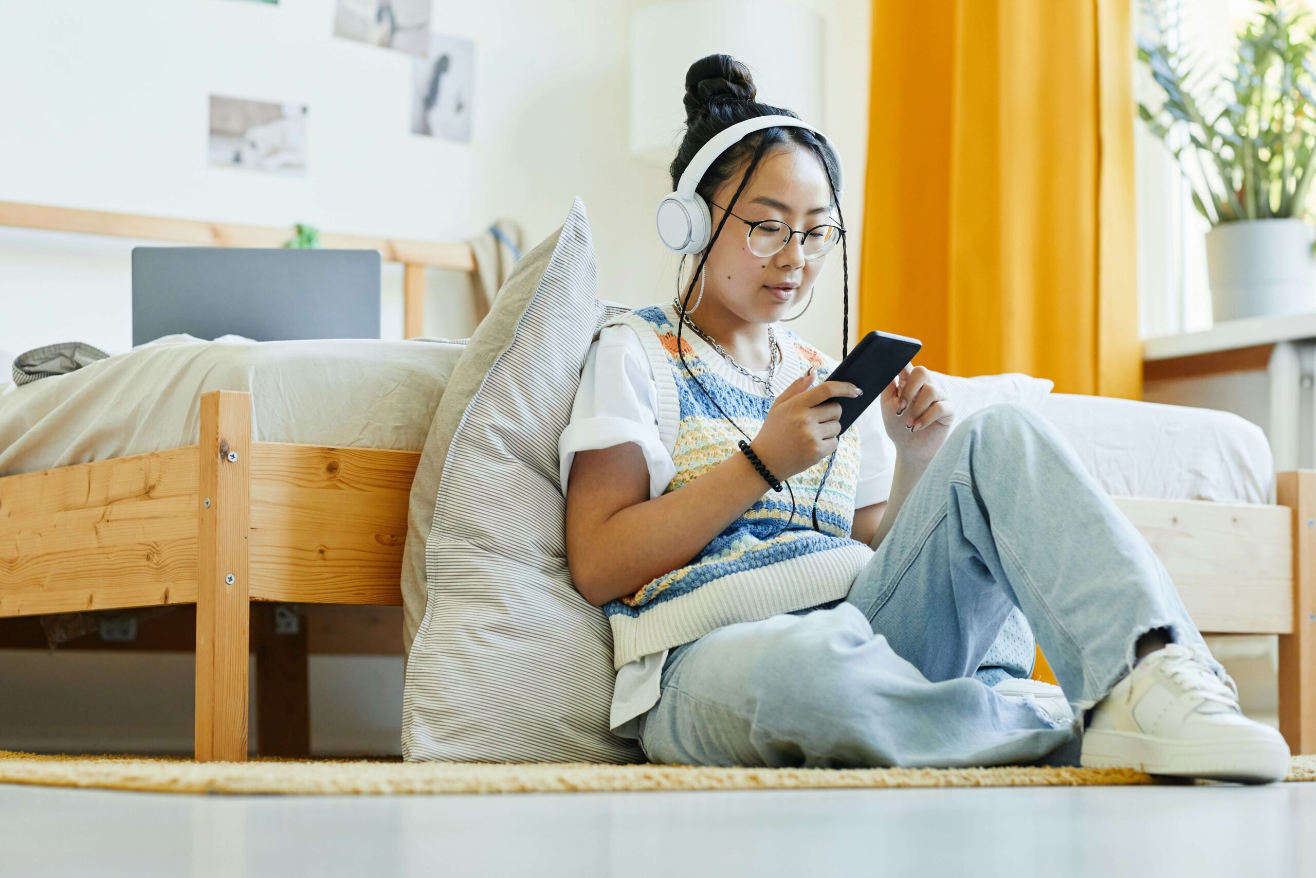 Teen girl using her phone