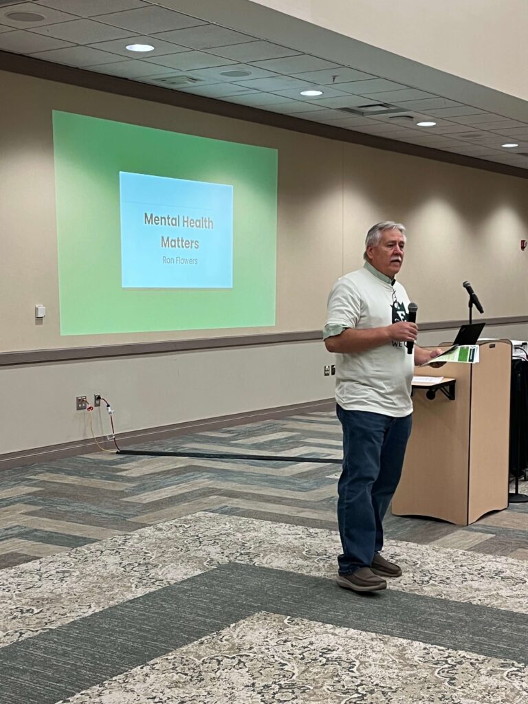 Eastern Michigan University's Dr. Ron Flowers addressing the College of Business about supporting student mental health