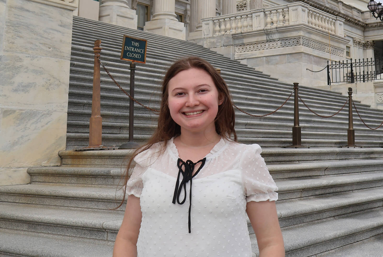 Ivanna SIntes standing in front of capitol building 